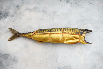 smoked mackerel fish on a light background
