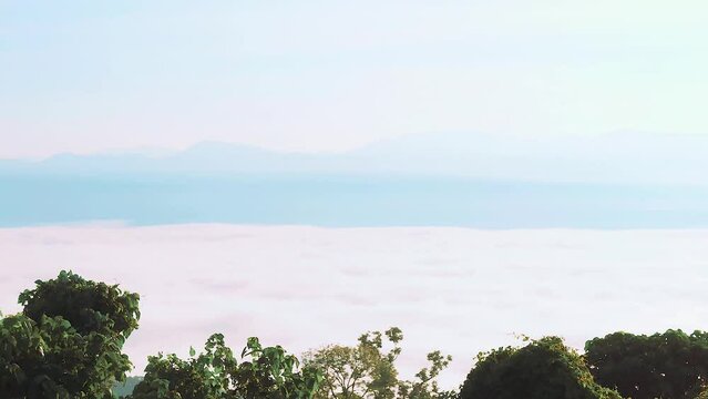 Picturesque timelapse of white fluffy clouds moving softly on the clear blue sky. Direct view from the sajek valley 