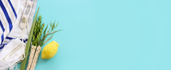 Jewish festival of Sukkot. Traditional symbols (The four species): Etrog (citron), lulav (palm...
