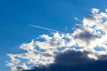 Light white clouds in blue sky background