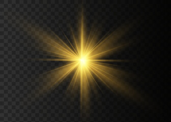 The star burst with brilliance. Yellow glowing light explodes on a transparent background. Bright Star. Golden Light effect.