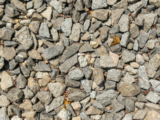 An overlay of grey pebbles with rich textures and high resolution.
