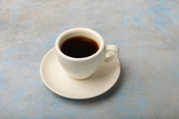 Fragrant coffee in a cup on a marble background.Espresso. Morning drink. Cheerful morning concept. Place for text. Place to copy.