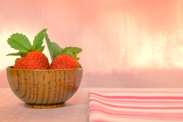Strawberries in a bowl on the table