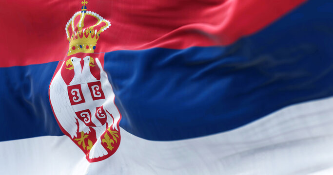 Close-up view of the Serbia national flag waving in the wind