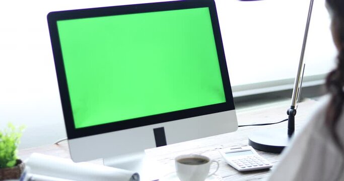 woman working on pc computer at office