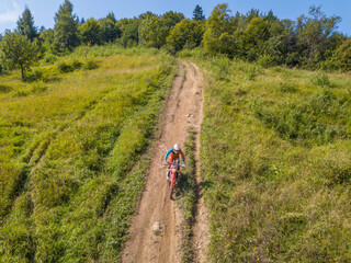 Enduro Athlete on a Summer Dirt Track. Aerial View