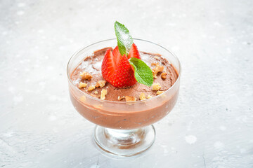 Sweet chocolate and strawberry ice cream in glasses. Top view. Free space for text.