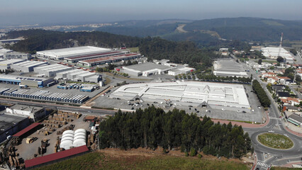 Ribeirao, Portugal, August 4, 2021: Aerial view of the SAM Business Park, located south of Famalicao county, this business park is served by the N14. The Supply Market.
