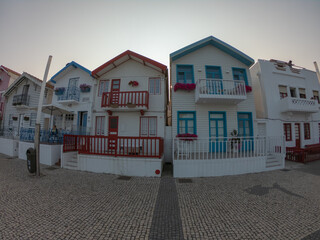 Gafanha da Encarnação, Portugal, August 21, 2021: The Colorful Houses in Costa Nova, Aveiro, Portugal. The striped colorful houses are known as 