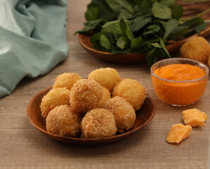 mac and cheese balls served on a plate
