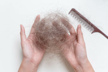 Concept of women's hair loss problem.