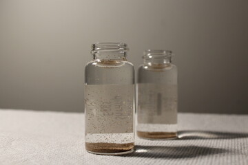 glass vials with sea monkeys