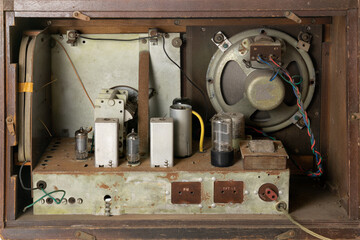 The interier of a rusty vintage five valve AC radio set or wireless receiver, AM,  that was built...