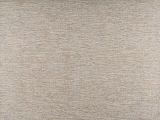 Fototapeta na wymiar Fabric matting beige texture. Textured background made of wool or synthetic fibers, polypropylene, nylon or polyester