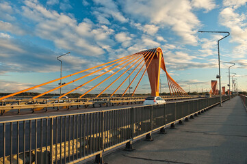 cable-stayed bridge in Riga, in the photo south bridge in the evening against the background of...