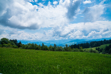 Austria, panorama nature landscape view from pfaender mountain at bregenz vorarlberg with clouds and forest