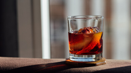 Negroni cocktail detail photography at sun light
