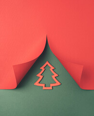 Obraz premium Christmas tree shaped cutout paper. Merry Christmas minimal background