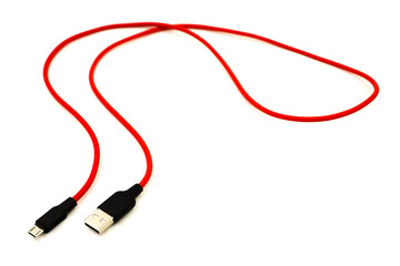 Red USB cable for smartphone isolated on white background.	