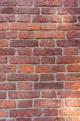 Empty brick red wall. background of a old brick house.
