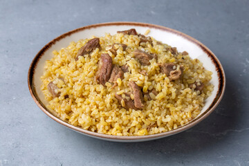 From traditional delicious Turkish cuisine; Bulgur pilaf with meat (Turkish name; etli bulgur pilavi)