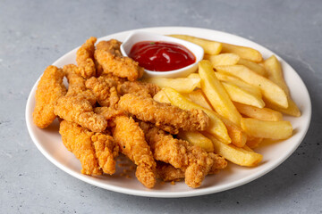 Homemade Crispy Chicken Tenders and French Fries