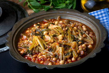 Spinach head dish or spinach head soup. It is a local dish. This dish, which is made in Adana, Turkey, is also sour. Turkish name; ispanak basi corbasi or yemegi