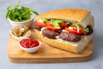 Delicious Turkish Meatballs Sandwich, Kofte Ekmek. Turkish name; kofte ekmek or ekmek arasi kofte