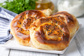 Traditional delicious Turkish phyllo stuffed with spinach, cheese (Turkish name; Gul borek or gul boregi) Rose shaped pastry.