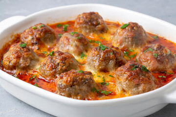 Meatballs with cheddar in the oven. Turkish name; Firinda kasarli kofte