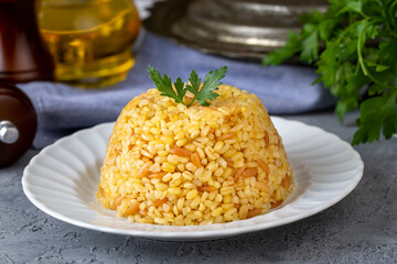 Traditional delicious Turkish food, bulgur pilaf with vermicelli (Turkish name; arpa sehriyeli bulgur pilavi)