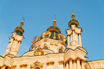 Fototapeta na wymiar baroque orthodox christianity church in kyiv with cupolas and crosses