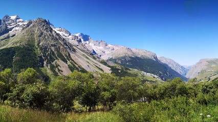 A mountain with snowy summit