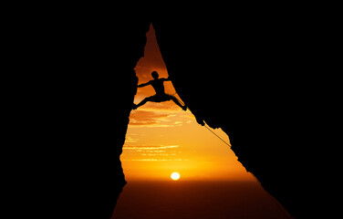 Mountain, sunset and hiking with the silhouette of a man climbing a cliff or rock outdoor in...