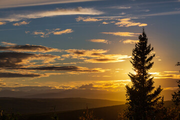Fototapeta na wymiar Mountains on sunset
