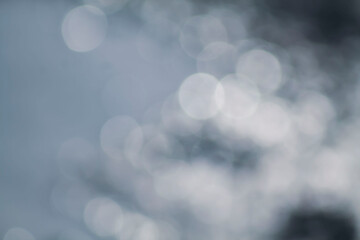Artistically blurred background with round bokeh. White background with bokeh.