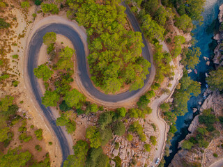 Winding road with river from Koprulu Tazi Canyon. Manavgat Antalya Turkey aerial top view