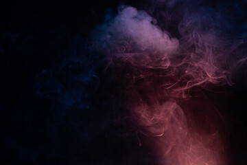 Blue and pink steam on a black background.