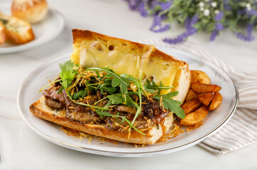 THE FARMER PAUL Sandwich with wedges served in a dish isolated on table side view of arabian fastfood