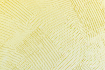 yellow background Patterns of putty on the wall