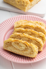 Sweet pie with nut flavor on plate.