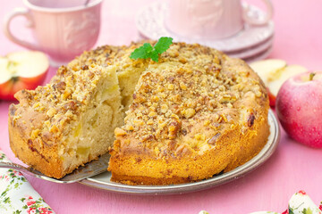Sweet apple cake with walnut topping for tea