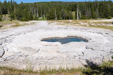 Spa Geyser in Yellowstone National Park on a sunny day
