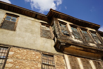 Fototapeta na wymiar Düğmeli Evler ( Buttoned houses ) with the traditional architectural style of the Anatolian towns of İbradı and Ormana. Antalya - Turkey
