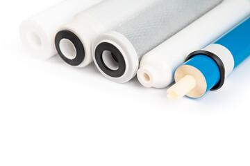 filter cartridges for water on a bright blue background.