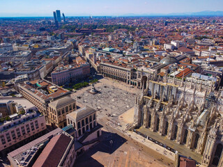 Aerial view of Piazza Duomo in front of the Gothic cathedral in the center. Drone view of the...