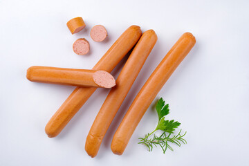 Traditional raw German Frankfurter sausage offered as top view on white background with copy space