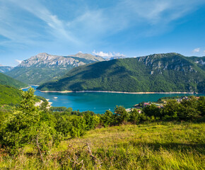 Naklejka na ściany i meble Piva Lake (Pivsko Jezero) and Pluzine town view in Montenegro.