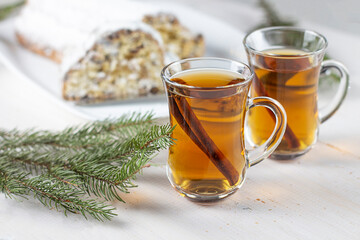 Mulled wine. Christmas mulled wine. Glass cup with mulled wine, decorated with cinnamon. copy space